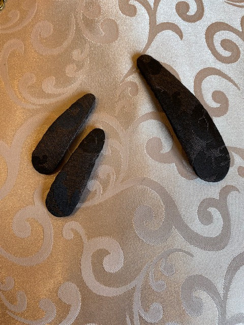 Barettes en jacquard noir